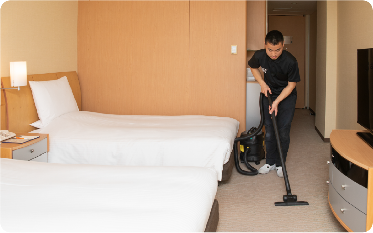 掃除機をかける様子